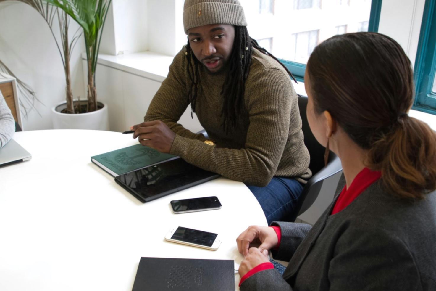 Business owners collaborating on financial strategies during remolarivqen networking event